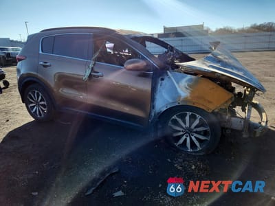 Czwarte zdjęcie samochodu z boku: 2017 KIA SPORTAGE EX VIN:KNDPNCAC0H7144368 - miniatura