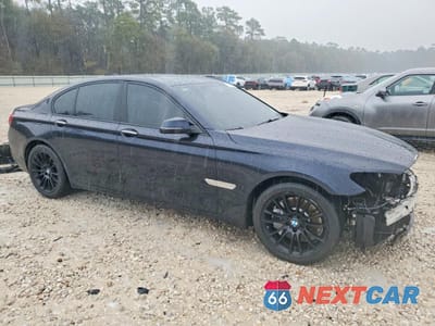 Czwarte zdjęcie samochodu z boku: 2015 BMW 750 I VIN:WBAYA8C53FD825759 - miniatura