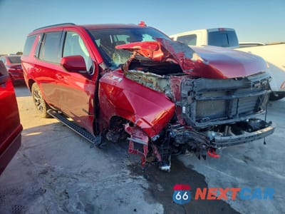 Czwarte zdjęcie samochodu z boku: 2021 CHEVROLET TAHOE K1500 Z71 VIN:1GNSKPKD6MR441247 - miniatura