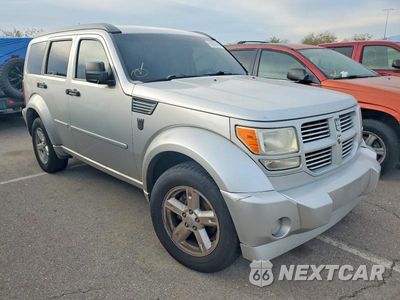 Czwarte zdjęcie samochodu z boku: 2011 DODGE NITRO SXT VIN:1D4PT5GKXBW547693 - miniatura