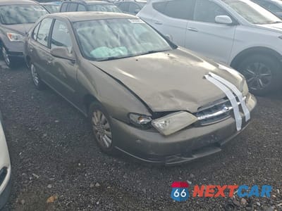 Czwarte zdjęcie samochodu z boku: 1999 NISSAN ALTIMA XE VIN:1N4DL01D0XC143734 - miniatura