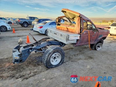 Trzecie zdjęcie samochodu z tyłu: 1984 FORD RANGER VIN:1FTCR11S7EUD80415 - miniatura
