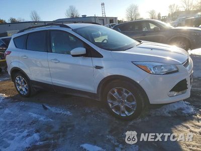 Czwarte zdjęcie samochodu z boku: 2016 FORD ESCAPE SE VIN:1FMCU0GXXGUA97341 - miniatura