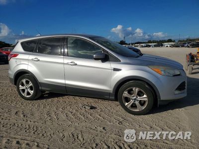 Czwarte zdjęcie samochodu z boku: 2016 FORD ESCAPE SE VIN:1FMCU0GX2GUA49767 - miniatura
