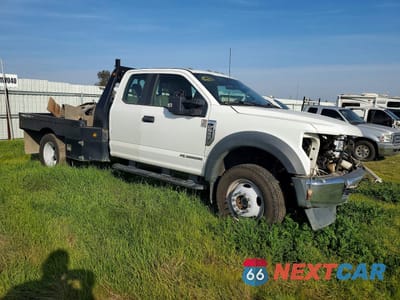 Czwarte zdjęcie samochodu z boku: 2022 FORD F550 SUPER DUTY VIN:1FD0X5HT3NEC65914 - miniatura