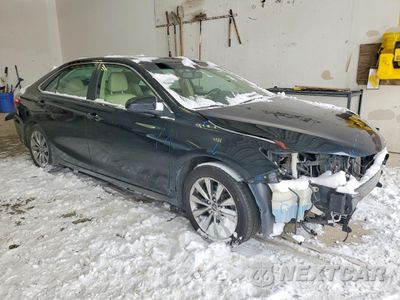 Czwarte zdjęcie samochodu z boku: 2015 TOYOTA CAMRY HYBRID VIN:4T1BD1FK8FU160488 - miniatura