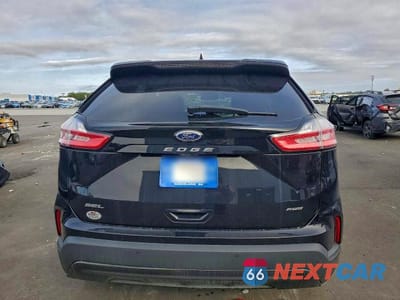 Zdjęcie 6 z 13 samochodu: 2022 FORD EDGE SEL VIN:2FMPK4J93NBA96849 - miniatura