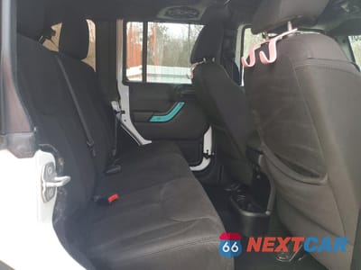 Zdjęcie 10 z 13 samochodu: 2014 JEEP WRANGLER UNLIMITED SPORT VIN:1C4BJWDG7EL208463 - miniatura