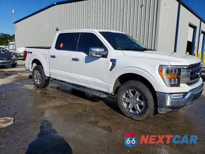 Czwarte zdjęcie samochodu z boku: 2021 FORD F150 SUPERCREW VIN:1FTFW1E86MFA66083 - miniatura