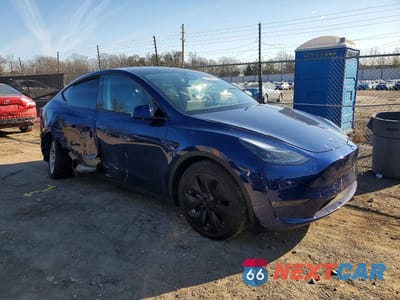 Czwarte zdjęcie samochodu z boku: 2023 TESLA MODEL Y VIN:7SAYGDEE4PF827086 - miniatura