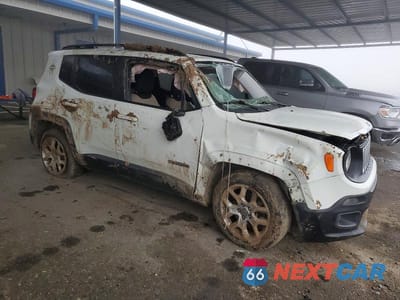 Czwarte zdjęcie samochodu z boku: 2016 JEEP RENEGADE LATITUDE VIN:ZACCJABT0GPE33541 - miniatura