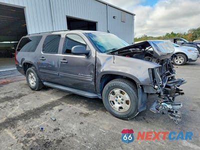 Czwarte zdjęcie samochodu z boku: 2010 CHEVROLET SUBURBAN C1500 LS VIN:1GNUCHE08AR226825 - miniatura