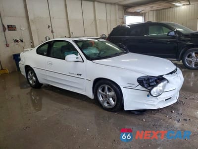 Czwarte zdjęcie samochodu z boku: 2001 PONTIAC GRAND AM GT VIN:1G2NW12E41M584551 - miniatura