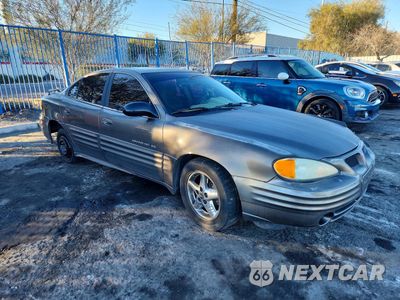 Czwarte zdjęcie samochodu z boku: 2002 PONTIAC GRAND AM SE1 VIN:1G2NF52F62C198706 - miniatura