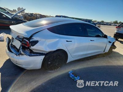 Trzecie zdjęcie samochodu z tyłu: 2022 TESLA MODEL 3 VIN:5YJ3E1EA9NF337989 - miniatura