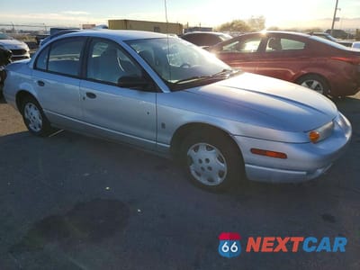 Czwarte zdjęcie samochodu z boku: 2002 SATURN SL1 VIN:1G8ZH52842Z179863 - miniatura