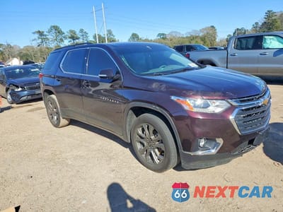 Czwarte zdjęcie samochodu z boku: 2020 CHEVROLET TRAVERSE LT VIN:1GNERGKW0LJ296200 - miniatura