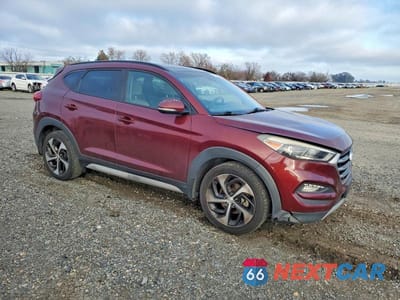 Czwarte zdjęcie samochodu z boku: 2017 HYUNDAI TUCSON LIMITED VIN:KM8J33A22HU562866 - miniatura