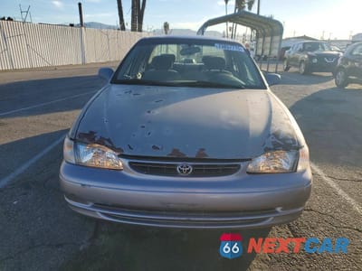 Piąte zdjęcie samochodu w środku: 2000 TOYOTA COROLLA VE VIN:1NXBR12E7YZ405172 - miniatura