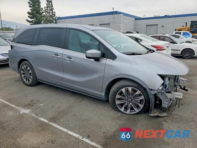 Czwarte zdjęcie samochodu z boku: 2023 HONDA ODYSSEY EXL VIN:5FNRL6H66PB044056 - miniatura
