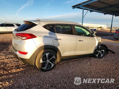 Trzecie zdjęcie samochodu z tyłu: 2016 HYUNDAI TUCSON LIMITED VIN:KM8J33A22GU154110 - miniatura