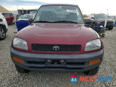 Piąte zdjęcie samochodu w środku: 1996 TOYOTA RAV4 VIN:JT3GP10V0T7002987 - miniatura