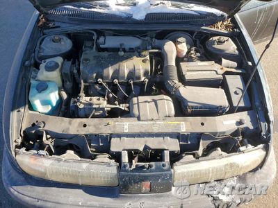 Zdjęcie 11 z 12 samochodu: 1999 SATURN SL1 VIN:1G8ZH5286XZ291684 - miniatura