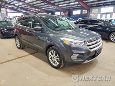 Czwarte zdjęcie samochodu z boku: 2018 FORD ESCAPE SE VIN:1FMCU9GD0JUC61570 - miniatura