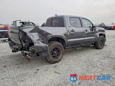 Trzecie zdjęcie samochodu z tyłu: 2022 TOYOTA TACOMA DOUBLE CAB VIN:3TMAZ5CN0NM196170 - miniatura