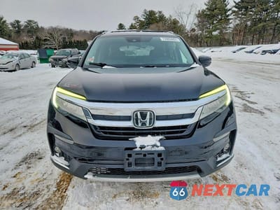 Piąte zdjęcie samochodu w środku: 2019 HONDA PILOT TOURING VIN:5FNYF6H6XKB034285 - miniatura