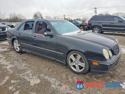 Czwarte zdjęcie samochodu z boku: 2001 MERCEDES-BENZ E 55 AMG VIN:WDBJF74J01B226140 - miniatura