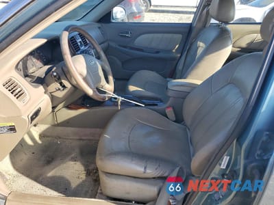 Zdjęcie 7 z 12 samochodu: 2004 HYUNDAI SONATA GLS VIN:KMHWF35H74A040578 - miniatura