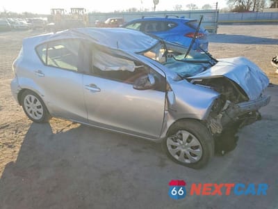 Czwarte zdjęcie samochodu z boku: 2013 TOYOTA PRIUS C VIN:JTDKDTB31D1047172 - miniatura