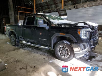 Czwarte zdjęcie samochodu z boku: 2022 GMC SIERRA K2500 SLE VIN:1GT59MEY0NF341601 - miniatura