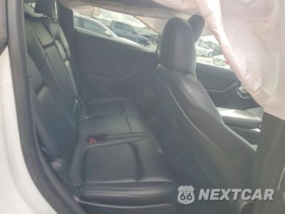 Zdjęcie 10 z 12 samochodu: 2022 TESLA MODEL Y VIN:7SAYGAEE3NF306923 - miniatura