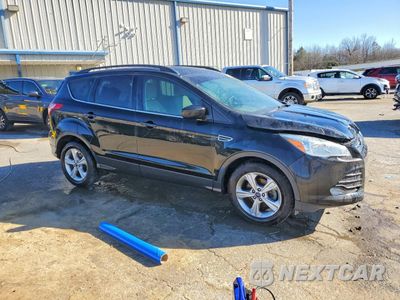 Czwarte zdjęcie samochodu z boku: 2014 FORD ESCAPE SE VIN:1FMCU0GXXEUE20753 - miniatura