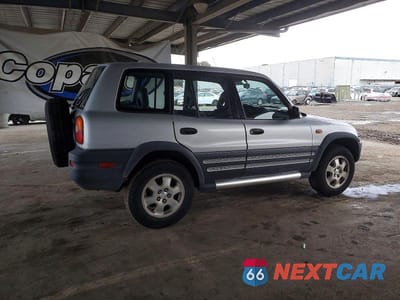 Trzecie zdjęcie samochodu z tyłu: 1997 TOYOTA RAV4 BASE VIN:JT3HP10VXV7033073 - miniatura