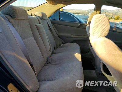 Zdjęcie 10 z 11 samochodu: 2004 TOYOTA CAMRY LE VIN:4T1BE32K34U298869 - miniatura