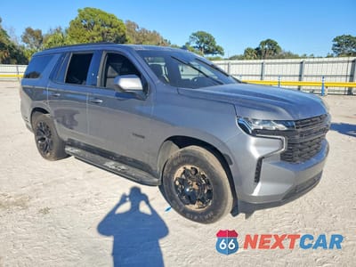 Czwarte zdjęcie samochodu z boku: 2021 CHEVROLET TAHOE C1500 LT VIN:1GNSCNKD9MR103312 - miniatura