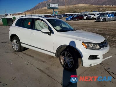 Czwarte zdjęcie samochodu z boku: 2014 VOLKSWAGEN TOUAREG V6 TDI VIN:WVGEP9BP8ED011467 - miniatura