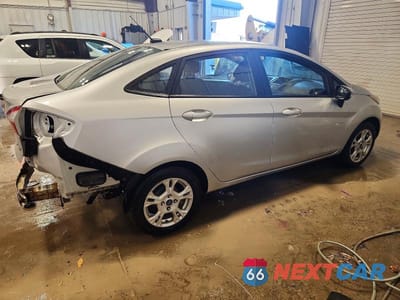 Trzecie zdjęcie samochodu z tyłu: 2016 FORD FIESTA SE VIN:3FADP4BJ9GM128888 - miniatura