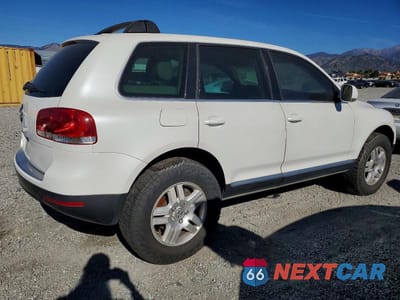 Trzecie zdjęcie samochodu z tyłu: 2004 VOLKSWAGEN TOUAREG 4.2 VIN:WVGCM77L84D040508 - miniatura