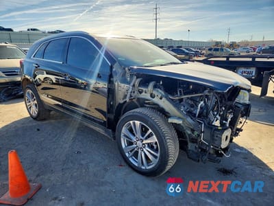 Czwarte zdjęcie samochodu z boku: 2024 CADILLAC XT5 PREMIUM LUXURY VIN:1GYKNDRS7RZ710294 - miniatura