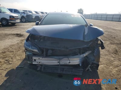 Piąte zdjęcie samochodu w środku: 2019 TOYOTA AVALON XLE VIN:4T1B21FB8KU001101 - miniatura