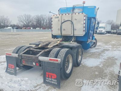 Czwarte zdjęcie samochodu z boku: 2000 INTERNATIONAL 9400 9400I - SEMI TRUCK VIN:2HSCNAER2YC042368 - miniatura