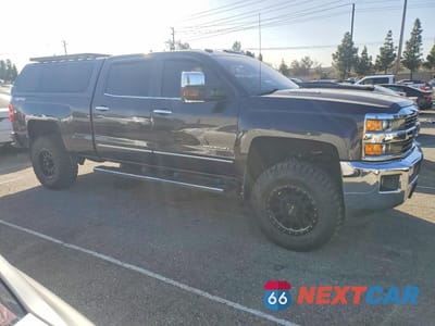 Czwarte zdjęcie samochodu z boku: 2016 CHEVROLET SILVERADO K2500 HEAVY DUTY LTZ VIN:1GC1KWE84GF151186 - miniatura