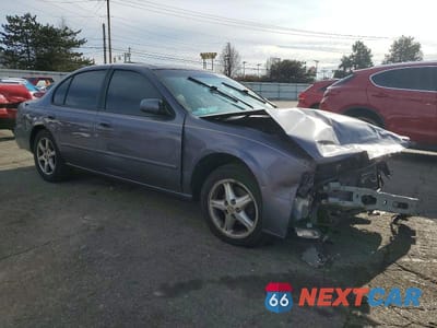 Czwarte zdjęcie samochodu z boku: 1997 NISS MAXIMA GLE VIN:JN1CA21D2VT201740 - miniatura