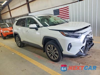 Czwarte zdjęcie samochodu z boku: 2022 TOYOTA RAV4 LIMITED VIN:JTMN1RFV6ND088790 - miniatura