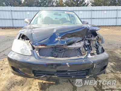 Piąte zdjęcie samochodu w środku: 2000 HONDA CIVIC LX VIN:1HGEJ6676YL028827 - miniatura
