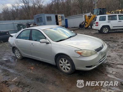 Czwarte zdjęcie samochodu z boku: 2003 TOYOTA CAMRY LE VIN:4T1BE30K13U727878 - miniatura